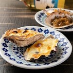 Oyster gratin in the shell