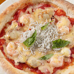 Seafood pizza with lots of seafood