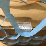 cafe suave bis - 不織布で出来ている手提げ袋。