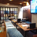 鶏と魚と炭火焼き 燈 - 小上がりの座敷席