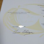 ロオジエ - 中にはエグゼクティブシェフのオリビエさんの直筆サイン。ちな、知人（主賓）のは文章が違ったさうです。