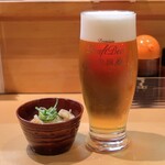 鉄板居酒屋OHANA - つきだしと熟撰生ビール
