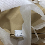 cafe suave bis - 一枚の不織布から出来ているテイクアウト用手提げ袋。凝ってます。