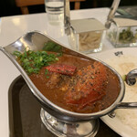 カレーの店ボンベイ - トマトとニンニクのカレーのアップ