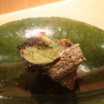 RISTORANTE IL NODO - サザエの壺焼きの状態でプレゼンテーション