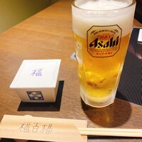 百福 - 取り敢えず残り少なく生ビール、口取りはふぐの煮凍り