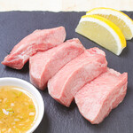 Thickly sliced Cow tongue with lemon and green onion salt sauce