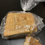 ウシマル - お土産のフォカッチャと自家製クッキー