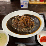 肉食堂 最後にカツ。 - 最強の肉カレー黒 1200円
            カレーアップ