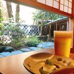 鍋茶屋 光琳 - 突き出しは生ビールに合うコウイカの木の芽ソース和え