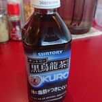 家系ラーメン たつ家 - 12/19　お店の自動販売機で黒烏龍茶を購入