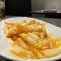 カリフォルニアラウンジ ステーキ＆ワイン 川崎店 - チーズラバーズポテト