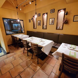 A playful interior surrounded by European pottery. Can reserved for up to 14 people