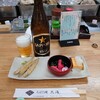 ろばた焼 北海 - 料理写真:瓶ビールとお通し