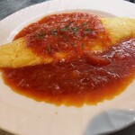 Fluffy omelette with fresh tomato sauce