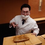 一本杉 川嶋 - 七尾の15キロのブリの藁焼き