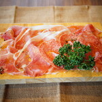 A heap of Prosciutto and salami