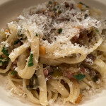 パッソ・ア・パッソ - タリアテッレ、アライグマのラグーソース