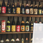 Kumasotei - 芋焼酎のボトルが並んでいます