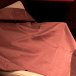 叙々苑 游玄亭 - 鞄の上に掛けてくれる。もちろんコートなども。