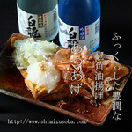 岩瀬の清水そば - 【 クーポン対象 】 あつあげ。ふっくらした豊潤な味わいの三角油揚げが丸ごと一枚。ヘルシーなサイドメニューです。