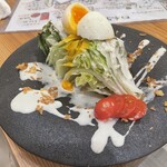 Caesar salad with charcoal-grilled lettuce and freshly shaved cheese