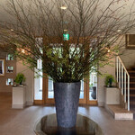 ピパ・ブルー - 入り口のフラワーアレンジメント