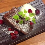 Homemade chocolate cake with vanilla ice cream