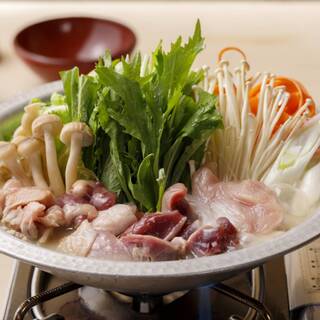 A rich Hot Pot soup made with chicken bones slowly cooked over 8 hours.