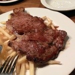 オレンジ - 牛リブステーキ　ポテトのフリット添え