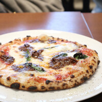 トラットリア イル レガーロ - レガーロランチコース
                    牛すじボロネーゼソースピッツァ