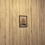 エードットカフェ - 壁には不思議の国のアリスのイラスト。