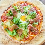 Special pizza with Prosciutto and soft-boiled eggs