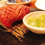 Thickly sliced green onion salted Cow tongue