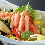 日本料理 源氏 - 根強い人気のカニサラダ。新鮮なカニの身を使用しております！
