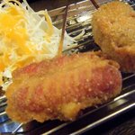 居食家　ちちかか - 串フライ・左：赤ウィンナー//￥100　右：しゅうまい//￥130