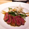 Trattoria MUTSUMI - 料理写真:【メインディッシュ】「黒毛和牛のタリアータ　野生のルッコラとパルミジャーノチーズ添え」