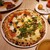 good spoon pizzeria&cheese - 料理写真:白ワインで煮込んだ牛肉とクレソンのピッツァ＆タコとオリーブのブッタネスカ　1380円