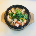 Vietnamese-style Ajillo with shrimp, squid, and mushrooms