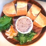 Homemade chicken liver paste served with rice flour baguette