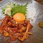 炭火野菜巻き串と餃子 博多うずまき - 国産地鶏ユッケ