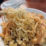 中国料理 峨嵋山 - 餡の下にはバリっと焼かれた麺が