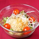 Japanese-style salad with cherry tomatoes and radish