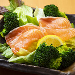 Salmon salad with lettuce and broccoli