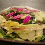 北海道焼肉 北うし - コールスローサラダ～旨味のクリアーカーテン(和出汁柑橘ジュレ)を乗せて～