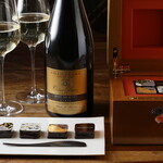 4 types of bonbon chocolate and a glass of champagne for 2 people