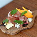 “Assortment of Italian Prosciutto, salami, and selected cheese”