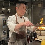 中津をにく - 木村さんが丹念に焼いてくれる