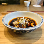 齋華 - ◆よだれ鶏。茹でた鶏肉を唐辛子や花椒・ラー油の入った辛いタレで食べる。美味い！