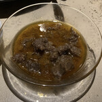 トゥゲチン - 羊肉の煮込み料理。めちゃくちゃオイリー